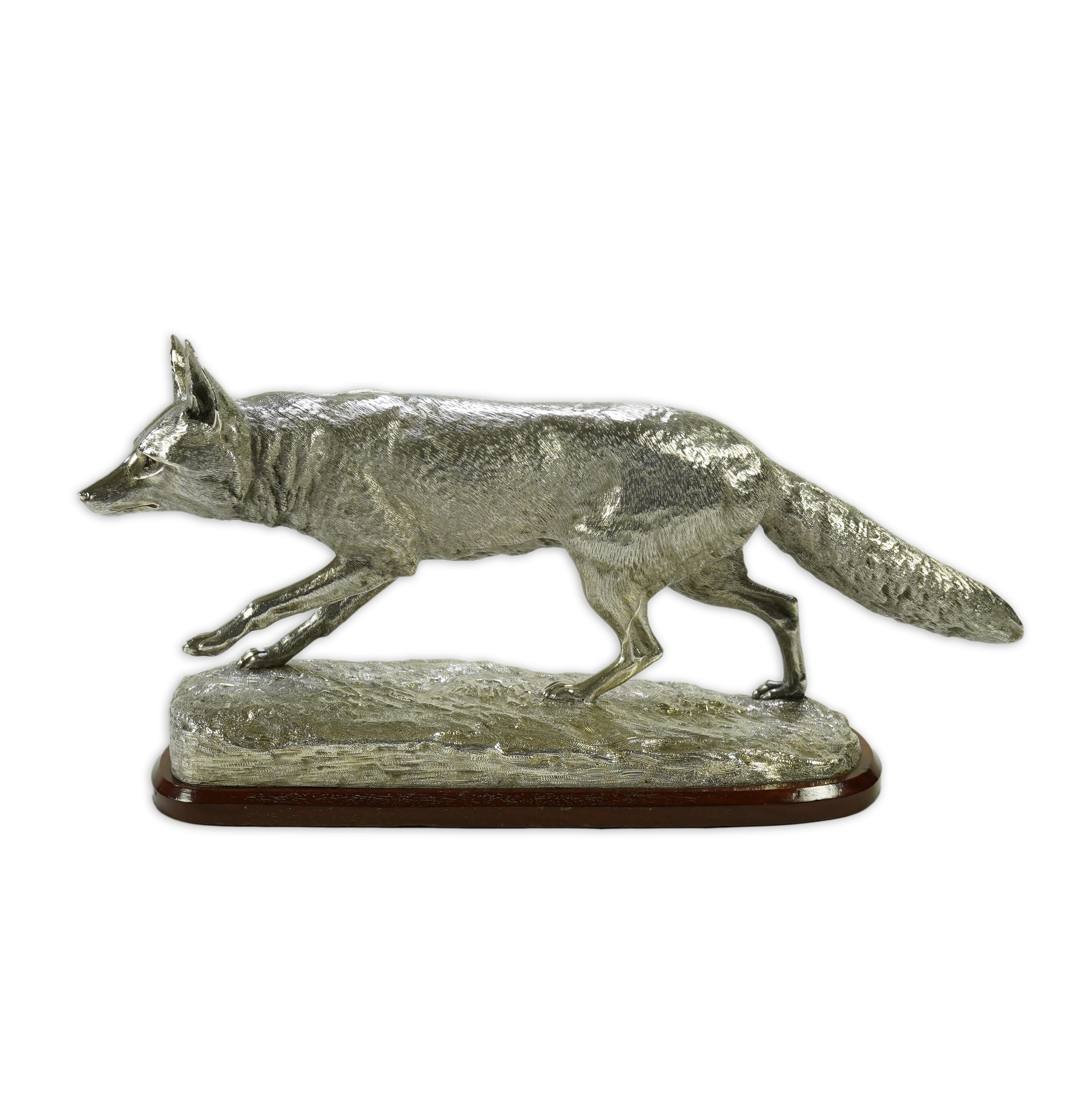 An impressive Victorian silver sculpture of a fox en passant, by R & S Garrard & Co (Robert Garrard II)